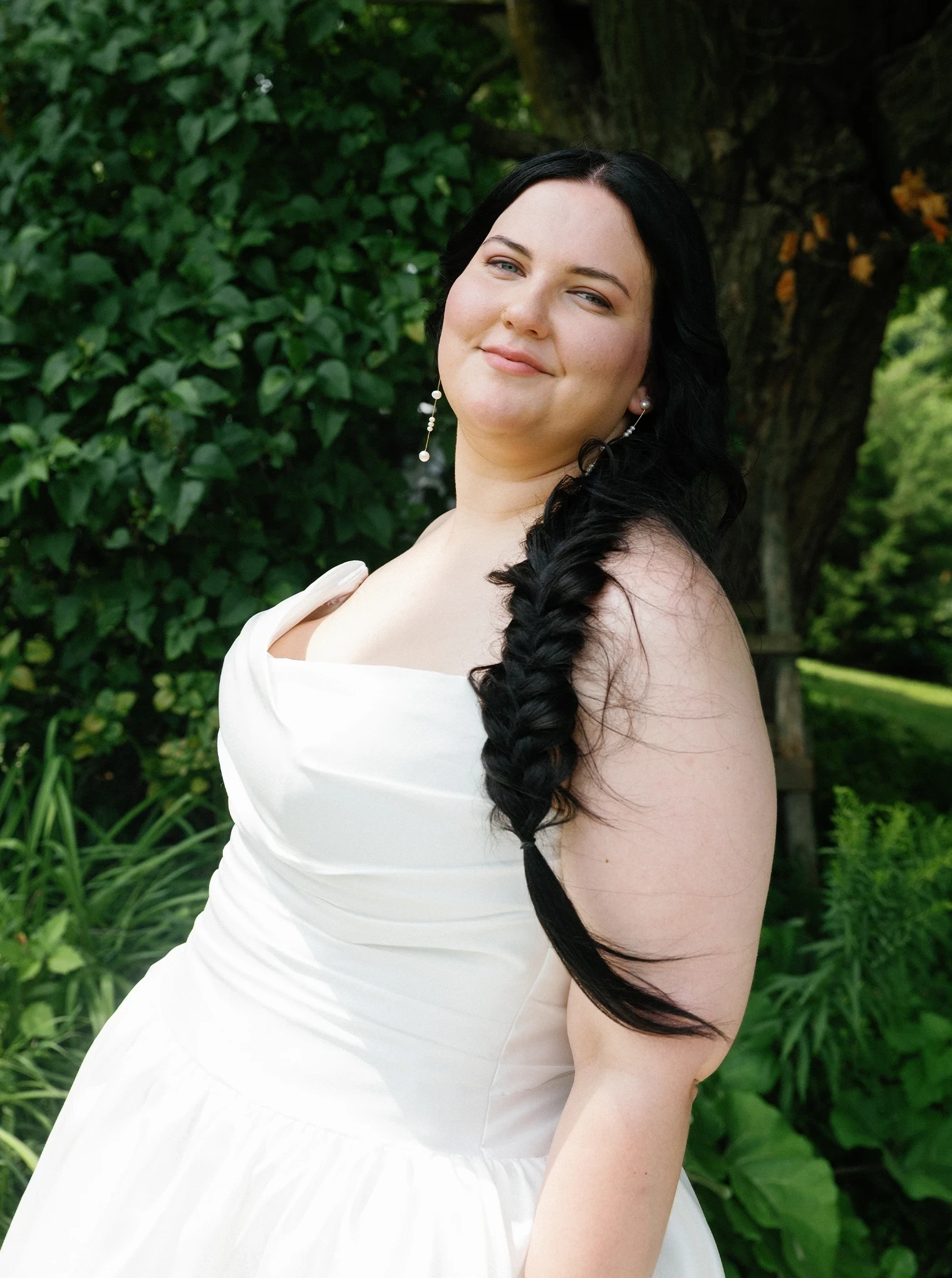 Photo of the model wearing a bridal gown.